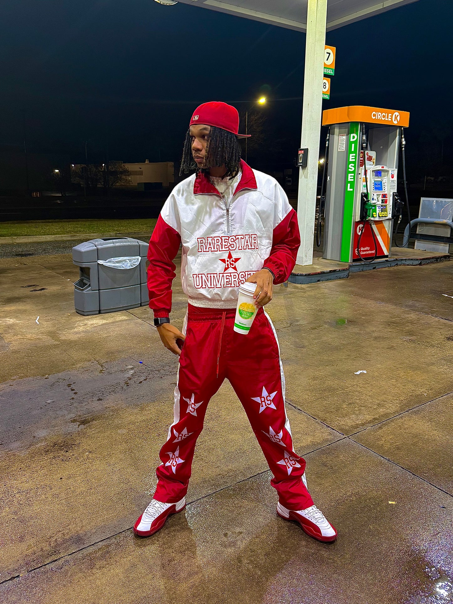 Red windbreaker suit